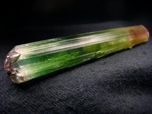 Single, double terminated tourmaline crystal from Afghanistan, Paprok  locality

Size 86 x 14 x 11 mm (Author: olelukoe)