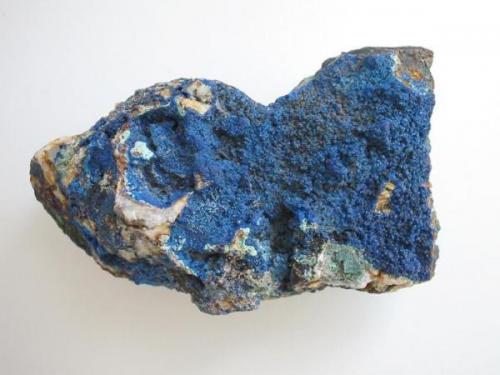 Deep blue azurite crystals forming a layer on quartz. In the 1960s and 1970s samples of this quality were not that rare on the dumps of the Glücksrad mine, Oberschulenberg, Harz mtns. Sample width approx. 10 cm. (Author: Andreas Gerstenberg)