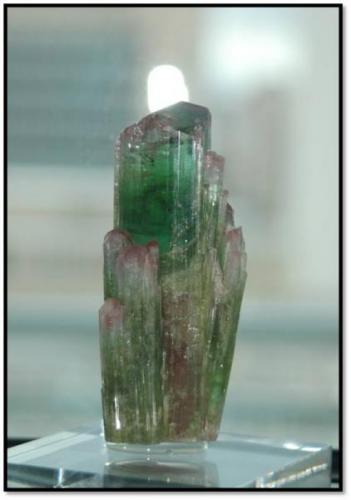 A large thick gem tourmaline from Nuristan, Afghanistan. Measures 5 x 2.5 x 2.5 inches, and is contacted on the back. Weighs 250 grams (Author: VRigatti)