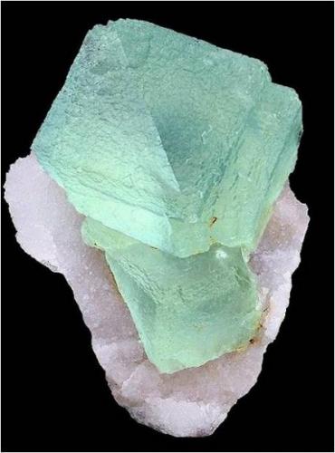 Huge gem green Fluorite on Quartz from Uis Tin mine in Namibia. Measures 14 x 10 x 10 cm and weighs 350 grams. (Author: VRigatti)