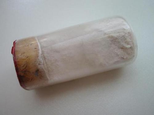 Rose bieberite powder in glass vial from the type locality Bieber, Spessart mtns., Hesse. Former William S. Vaux collection via Philadelphia academy. (Author: Andreas Gerstenberg)