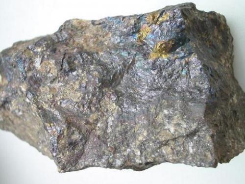 Massive bornite, a rather rare mineral from Kamsdorf, Thuringia. Picture width: 11 cm. (Author: Andreas Gerstenberg)