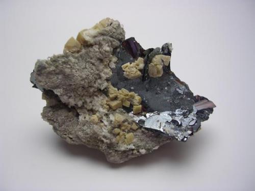 Hematites con rutilo y calcita, Cavradi, Val Tavetsch, Suiza, 5,3x3,5x2,5 cm. (Autor: Edelmin)