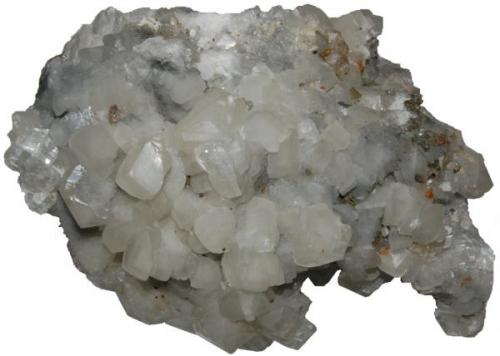 Dolomita en matriz de Fluorita.
Tamaño: 11,4x18x13,1. Cristal más grande: 1,3x1,5x2,2. (Autor: Andrés López)