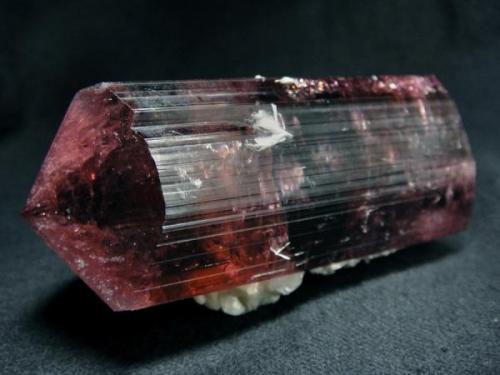 Tourmaline Rubellite, covered with a crust of stilbite crystals. Russia, Chitinskaya oblast., Sosedka pegmatite vien, Malkhan

Size is: 77 x 40 x 40 mm (Author: olelukoe)