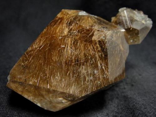 Rutilated quartz crystal (new found), from Tyoplaya Gora, Ust’-Tiskos, Gornozavodskii area, Permskaya Oblast’, Middle Urals, Urals Region, Russia

Size 70 x 56 x 40 mm (Author: olelukoe)
