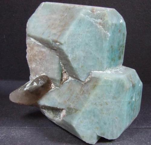 Amazonite twins with smoky Quartz, allegedly from the Devils Head pegmatite in Colorado, 6.7 cm tall (Author: nurbo)