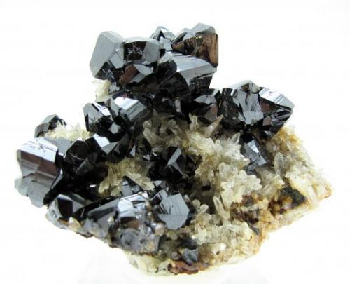 Cassiterite, quartz
Viloco Mine (Araca mine), Loayza Province, La Paz Department, Bolivia
83 mm x 72 mm x 49 mm. Main cassiterite crystal: 17 mm tall, 16 mm wide (Author: Carles Millan)