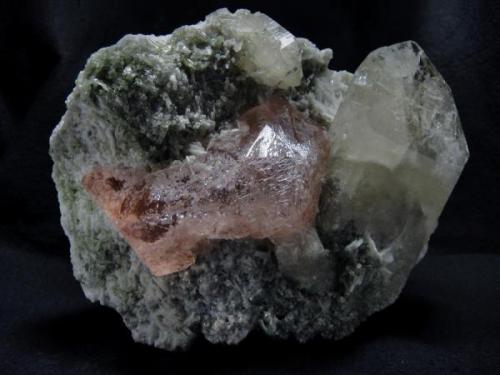 XL specimen with 9 cm morganite crystal, that nested on a clevelandite matrix with a quartz and green tourmaline crystals, from Darra-i-Pech Pegmatite Field, Nangarhar Province, Afghanistan

Size 165 x 88 x 110 mm (Author: olelukoe)