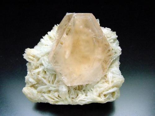 Beryl, var. Morganite on Albite, White Queen Mine, Pala District. 4 cm across. (Author: Jesse Fisher)