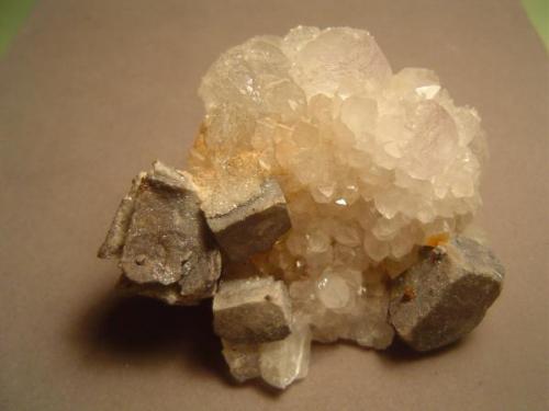 Quartz, fluorite and galena. 7.5 X 6.5 cm.  sunshine Drift, Blanchard Mine, Bingham, New Mexico.  The galena has been replaced by a mixture of anglesite and cerussite. (Author: Ed Huskinson)