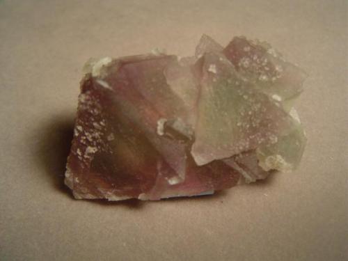 Fluorite.  Cook’s Peak, Luna County, New Mexico. 5.5 X 3.0 cm.  Acquired from Dick Jones in 1980. These things were abundant in the 80’s, not so much today.  This is a special specimen because it indicates there was a change in the temperature of the ore-forming solutions. (Author: Ed Huskinson)