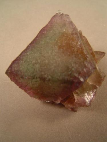 Fluorite (octahedral).  Lookout #1 Mine, Cook’s Peak, Luna county, New Mexico.  The octahedron is 4.5 cm across.  From Dick Jones, 1980.  The subtle colours displayed by these specimens is difficult to capture. (Author: Ed Huskinson)