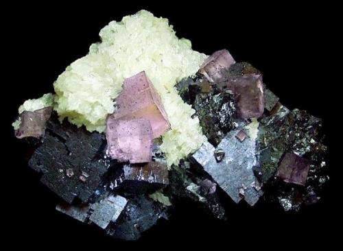 Fluorite with Galena, Sphalerite, Barite and Bitumen

Elmwood Mine
Middle Tennessee District
Carthage
Smith County, Tennessee
United States of America

9.0 x 14.0 x 6.5 cm overall (Author: GneissWare)