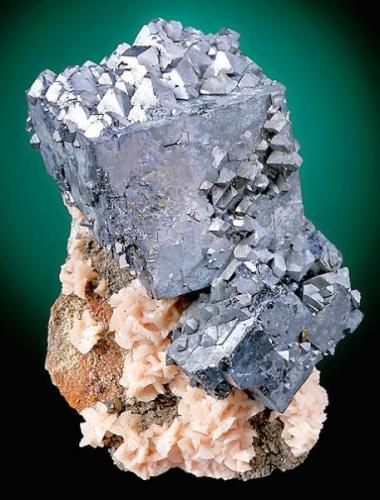 Galena with Dolomite
Barr Mine, Tri-State District, Picher Field, Treece, Cherokee County, Kansas
12.5 x 9.0 x 7.8 cm. overall

Great photo (and specimen) downloaded by Gneissware here -> http://www.mineral-forum.com/message-board/viewtopic.php?p=14020#14020

Thanks Bob! (Author: Jordi Fabre)