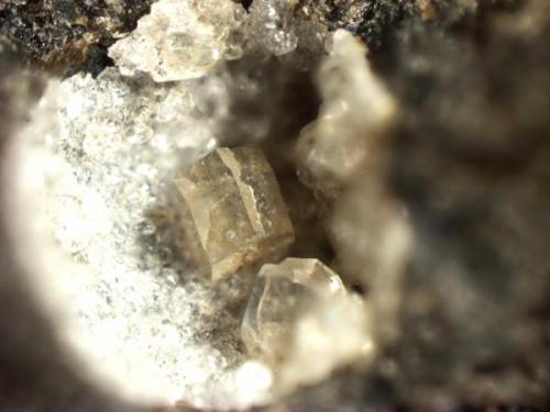 Phillipsite
Sugar Grove, Pendleton County, West Virginia, USA
Twinned phillipsite crystal. The crystal is 0.4 mm across the top edges. Composite of 12 images. (Author: Pete Richards)