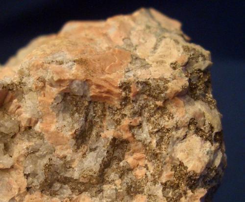Brassy looking little flakes of Stipnomelane from the French Creek Mine #2, Chester County, Pennsylvania. Field of veiw is 1 3/4" (4.45 cm). (Author: Jim Prentiss)