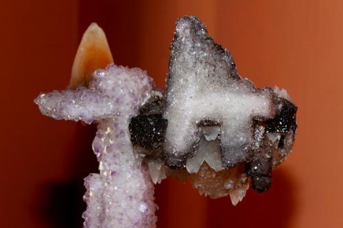 Amethyst stalactite of approximately 1 meter in height, covered by calcite with Amethyst, detail of tip of about 25 cm X 15 cm X 15 cm.  Uruguay (Author: silvio steinhaus)