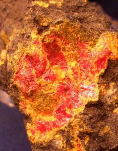 Realgar from the Cold Bar Mine, Eureka County, Nevada. This is a nice color if nothing else. the specimen is 3 1/4’ x 2 1/2" (8.26 x 6.35 cm) (Author: Jim Prentiss)