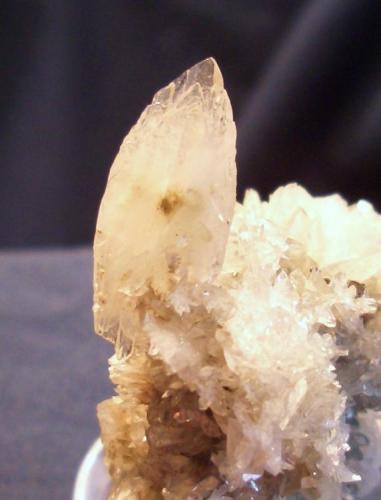 For a little flash I have added my Colemanite, The large blade is 7/8" x 3/8" (2.22 x 0.95 cm). This example is from the Boraxo Mine, Death Valley, Inyo County, California. (Author: Jim Prentiss)