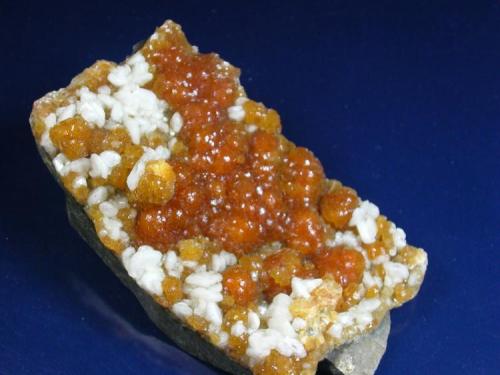 Stilbite with calcite, Kibblehouse quarry, Perkiomenville, Montgomery Co., 8 cm in long dimension. (Author: John S. White)