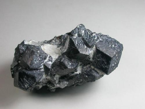Magnetite, Grace mine, Morgantown.  These crystals are distinctive in that they are dodecahedral, 7 cm across. (Author: John S. White)