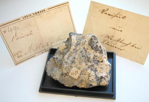 Yellowish variscite from the Messbach quarry, Plauen, Voigtland, Saxony. 5,5 cm sample from the type locality with old labels. (Author: Andreas Gerstenberg)