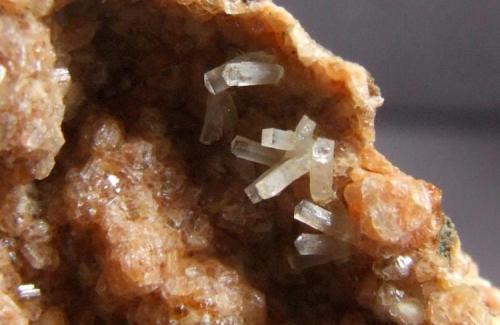 Natrolite on Gmelinite, Little Deer Park Quarry,Glenarm, Co Antrim, Northern Ireland, FOV approx 10 x 7 mm (Author: nurbo)
