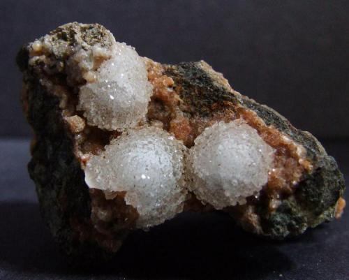 Natrolite on Gmelinite, Little Deer Park Quarry,Glenarm, Co Antrim, Northern Ireland, 30 x 20 mm (Author: nurbo)