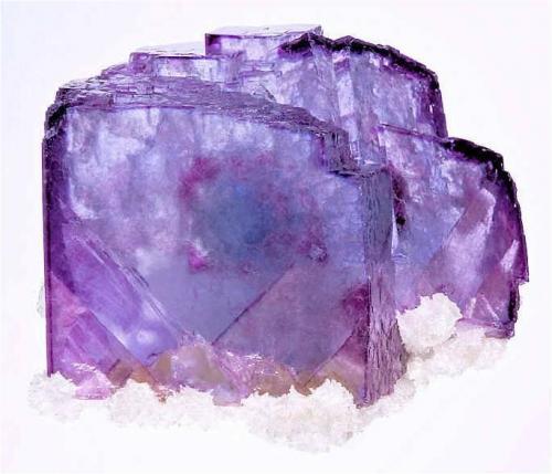 Color-zoned and very gemmy Fluorite on Calcite from Yaogangxian mine, China. Measures 5.2 x 6.4 x 4 cm and weighs 75 grams (Author: VRigatti)