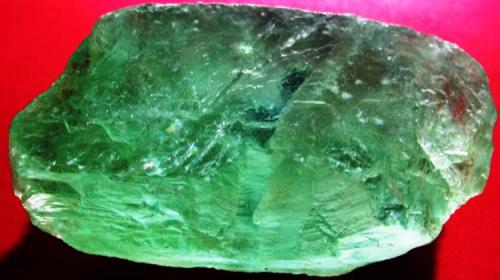 Cristal de Fluorita verde con luz posterior, El Rodeo Durango, México. , 8.5x5x4cm. (Autor: Luis Edmundo Sánchez Roja)
