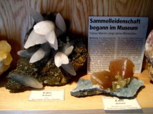 Calcites from Irai and German Juchem Quarry next to an article about my museum exhibition. (Author: Tobi)