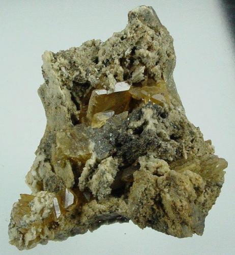 8 x 6 cm. Honey coloured tabular crystal of barite with minor galena() on dolomite. There is some damage to this piece, hence the price. The piece could be trimmed. The largest barite.jpg (Author: Anton Potgieter)