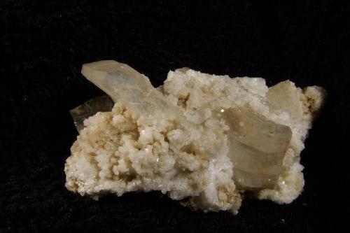 Heulandite + chabazite
Sgurr nam Boc, Isle of Skye, Scotland, UK
Specimen is 4 cm x 2 cm.
Heulandite crystals to 12mm on very small friable chabazite crystals.

Heulandite crystals to 12mm on very small friable chabazite crystals. Specimen is 4 cm x 2 cm. Self-collected in 2002 from Moonen Bay, Isle of Skye. (Author: Mike Wood)