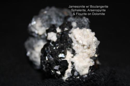 Jamesonite: 
with Boulangerite, Sphalerite, Arsenopyrite and Fluorite on Dolomite
Sombrerete, Mexico (Author: Bruce Sevier)