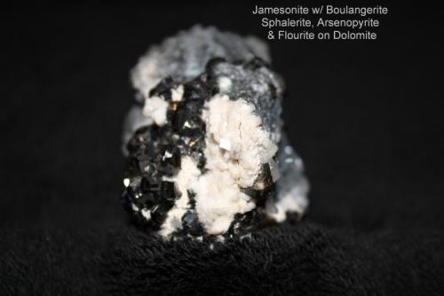 Jamesonite: 
with Boulangerite, Sphalerite, Arsenopyrite and Fluorite on Dolomite
Sombrerete, Mexico (Author: Bruce Sevier)