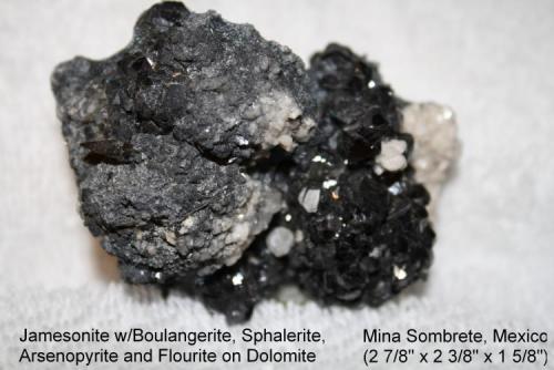 Jamesonite: 
with Boulangerite, Sphalerite, Arsenopyrite and Fluorite on Dolomite
"Mina Sombrerete", Mexico 
specimen size: 7.3 x 6 x 4.1cm (Author: Bruce Sevier)