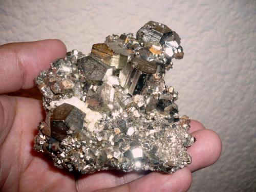 The first one is a nice Pyrite 
from Concepción del Oro, Zacatecas.
85 x 105 x 90 mm
Main crystal: 13 mm on edge (Author: Carlos M.)