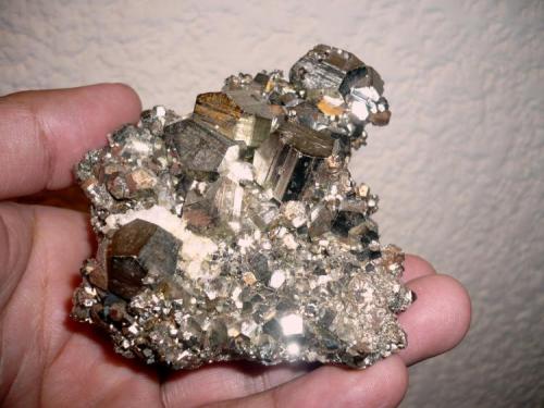 The first one is a nice Pyrite 
from Concepción del Oro, Zacatecas.
85 x 105 x 90 mm
Main crystal: 13 mm on edge (Author: Carlos M.)