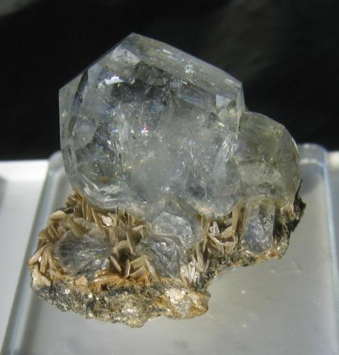 Beryl var. Aquamarine with Muscovite
Huya beryl-scheelite deposit, Huya village, Mt Xuebaoding, Pingwu Co., Mianyang Prefecture, Sichuan Province, China
Size: 4.3 x 3.7 x 3.0 cm (miniature)
 (Author: Leon56)