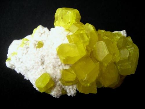 Sulphur on calcite
Cozzodisi Mine, Casteltermini, Agrigento Province, Sicily, Italy
80 x 50 x 50 mm (Author: Tobi)