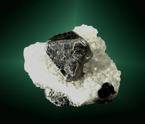 Galena
Lanreath, Menheniot, Liskeard (dist.), Cornwall (county), Inglaterra, Reino Unido. Herodsfoot (North Herodsfoot) (m).
Cristal octaédrico con caras de cubo i de rombododecaedro, sobre cuarzo. (ejemplar de 1966).
2,2 x 2,2 x 1,0 cm. / cristal: 1,1 x 1,0 x 1,0 cm.
           imatge: galena_1966_02 (Autor: Carles Curto)
