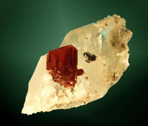 Brookita
Pashine, Kharan, Baluchistan, Pakistan. Ras-Koh.
2,8 x 3,6 x 2,7 cm. (ejemplar)
Cristal perfilado, de contornos muy definidos, marrón, en cuarzo.
Ejemplar de 2004. (Autor: Carles Curto)