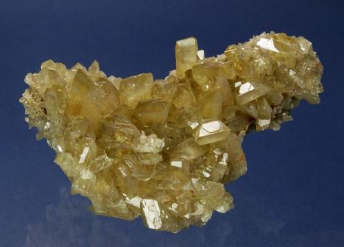 Barite
Dee Mine, On Main Decline, Bootstrap District, Elko County, Nevada, USA
110 x 79 x 60 mm
Honey-colored, chisel-shaped Barites to 20 mm completely cover this specimen. The Barites range from transparent and lustrous to slightly frosted. (Author: GneissWare)