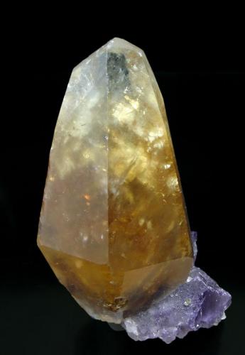 Calcite and Fluorite
Rosiclare level, Denton Mine, Hardin County, Illinois, USA 
Specimen size: 7.8 × 4.5 × 4.2 cm. 
Main crystal size: 6.6 × 3.8 cm.
Fluorite & Calcite fluorescent long & short UV
From the former Jan Buma Collection
Photo: Reference Specimens (Author: Jordi Fabre)