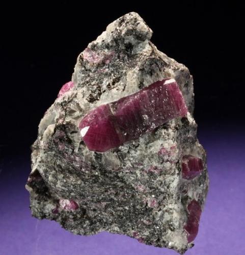 Corundum var. Ruby
Mysore District, Karnataka, India
50 x 45 x 40 mm, main crystal 25 mm long
(Photo © by vendor and previous owner Klaus Krause) (Author: Tobi)