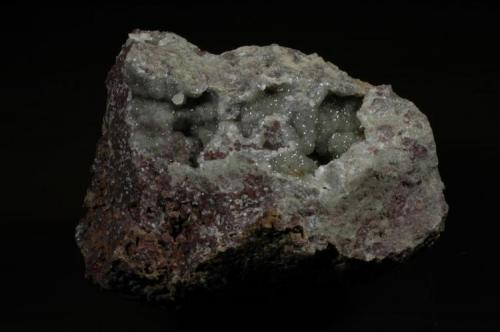 Prehnite, minor copper
Knife River, St. Louis County, Minnesota, USA
8 X 6 X 5 cm
Gemmy light green prehnite, some copper inside. (Author: John Nash)