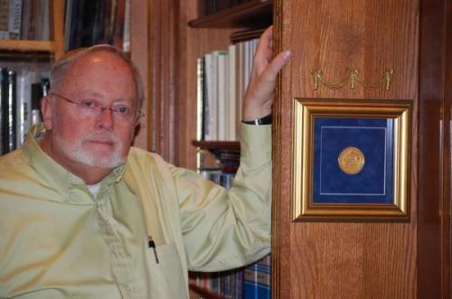 William W. Pinch posing with his medal that he won, it was the first edition of the trophy (Author: Pinch Bill)