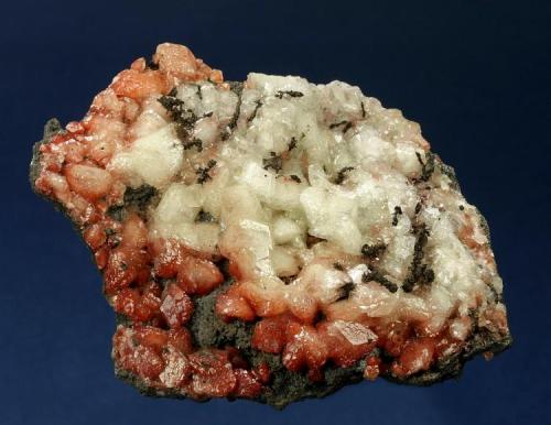 Copper on Calcite included with Cuprite
Czar Mine, Warren District, Bisbee, Cochise County, Arizona, USA
73 x 60 x 15 mm (Author: GneissWare)