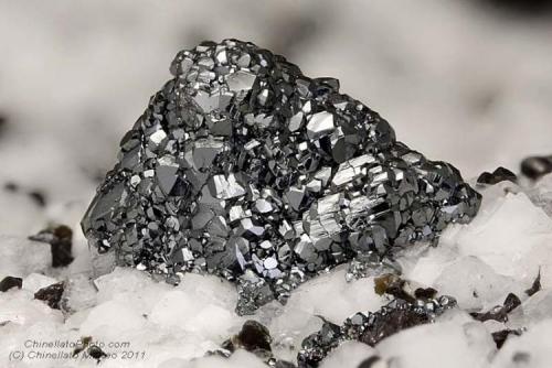 Rutile
Mt Cervandone (Scherbadung), Devero Alp (Devero Valley; Val Devero), Baceno, Ossola Valley, Verbano-Cusio-Ossola Province, Piedmont, Italy
3.98 mm group of Rutile crystals in epitaxy on a probable Titanite crystal (Author: Matteo_Chinellato)
